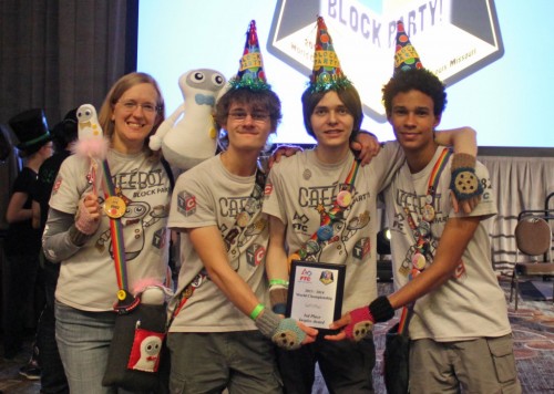 Cafe Bot coach Kimberly Sanders, Peter Kersulis, Brandon Sanders and Ethan Michalichek received the third place Inspire award Saturday afternoon at the FIRST Tech Challenge closing ceremony at America’s Center. Photo provided by Cafe Bot.