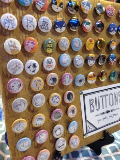 Artist Kate Sherron sells buttons Sunday morning at Wizard World St. Louis Comic Con. (Photo by Erica Smith, RealTime/STL)